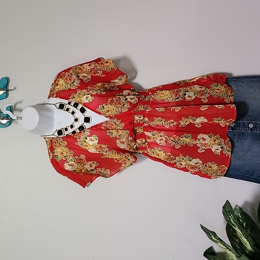 Floral Coral-ish forever 21 sheer Blouse has a low V cut and a ties in back.